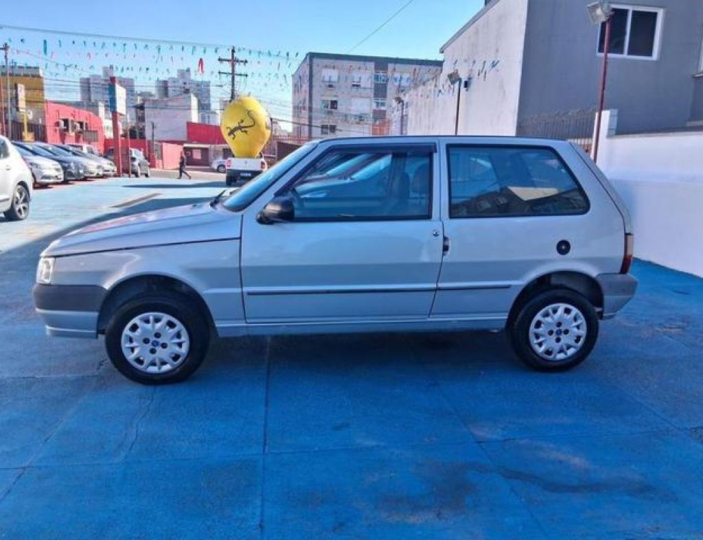 ***Repasse***Fiat / Uno Mille Economy 1.0 2 Portas Flex Modelo 2013 imagem 4